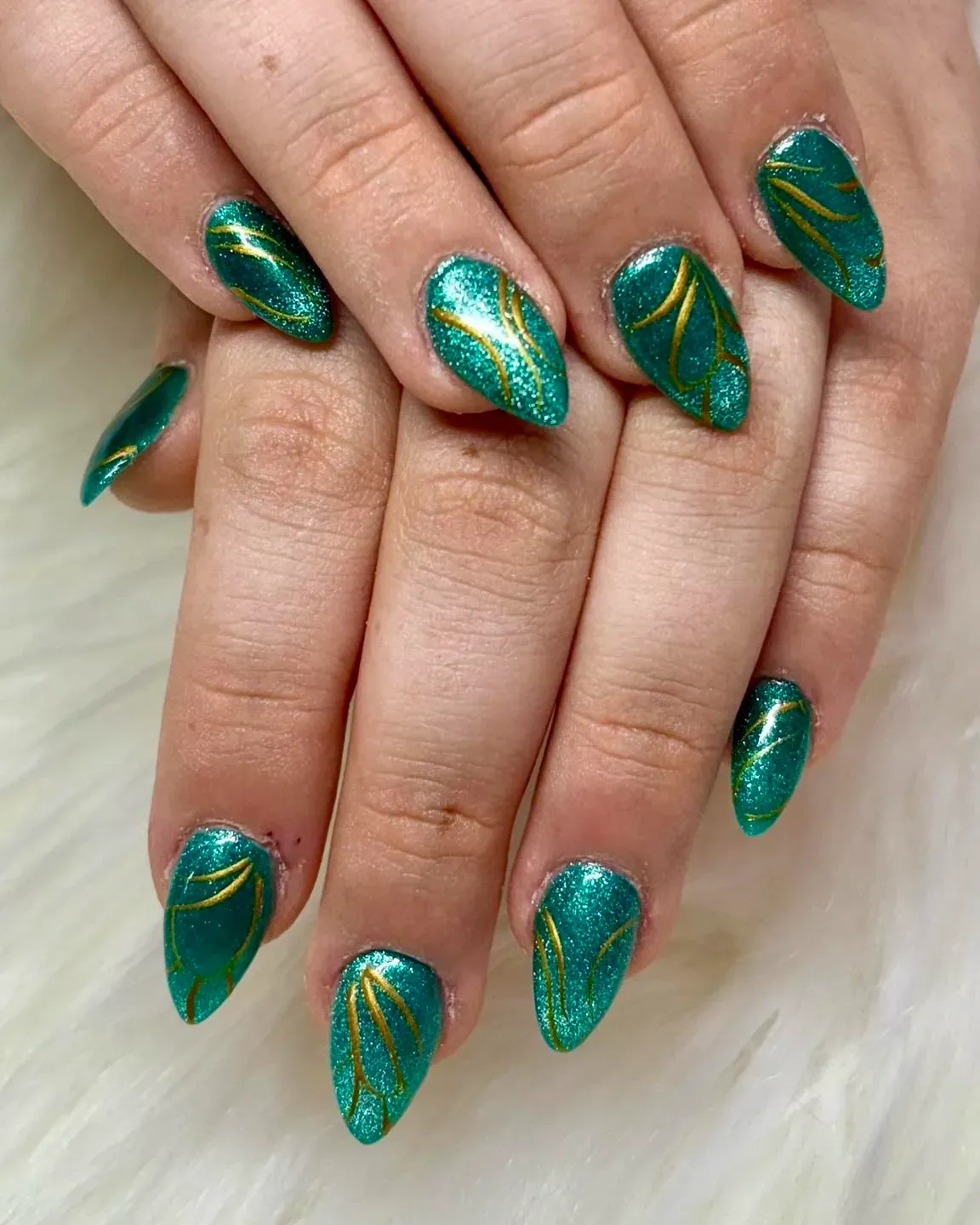 Green gel nails with a glossy finish